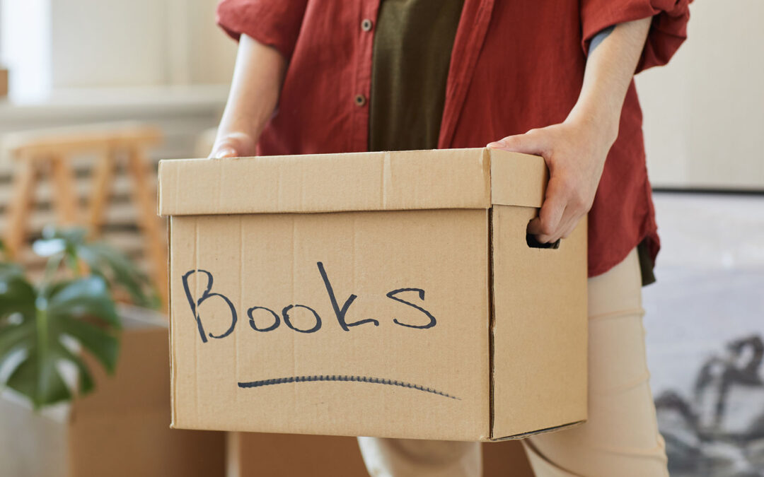 Woman packing the books